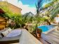 Two storey apartment with garden and pool